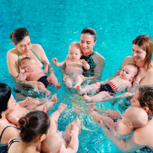 Swimming class with mums and babies at Pat Taylor Swim School